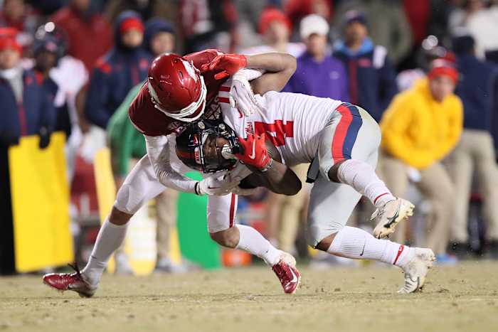 Arkansas safety Hudson Clark tackles Ole Miss running back Quinshon Judkins during their 2022 meeting.
